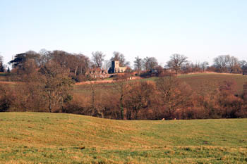 Battlesden church and Old Rectory shot from A5 January 2008